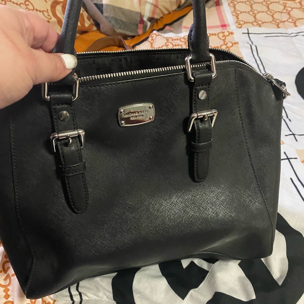 Real micheal kors purse used a couple of times in good condition